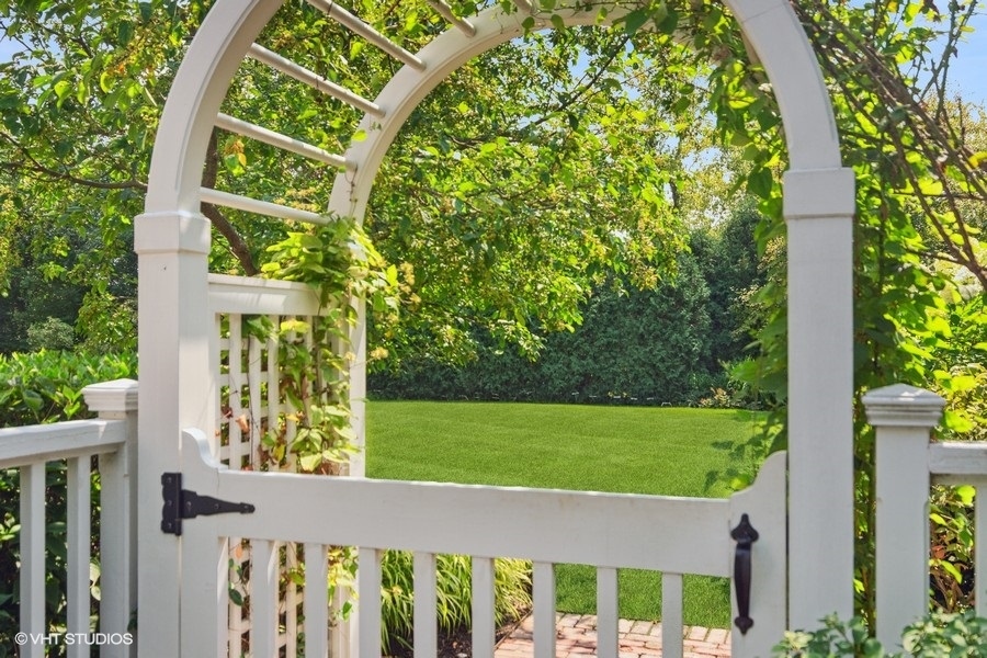 433 Signal Hill Road North Barrington, IL 60010 - Photo 40 of 44 a view of a house with a small yard and plants