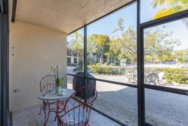 a room with furniture and a window