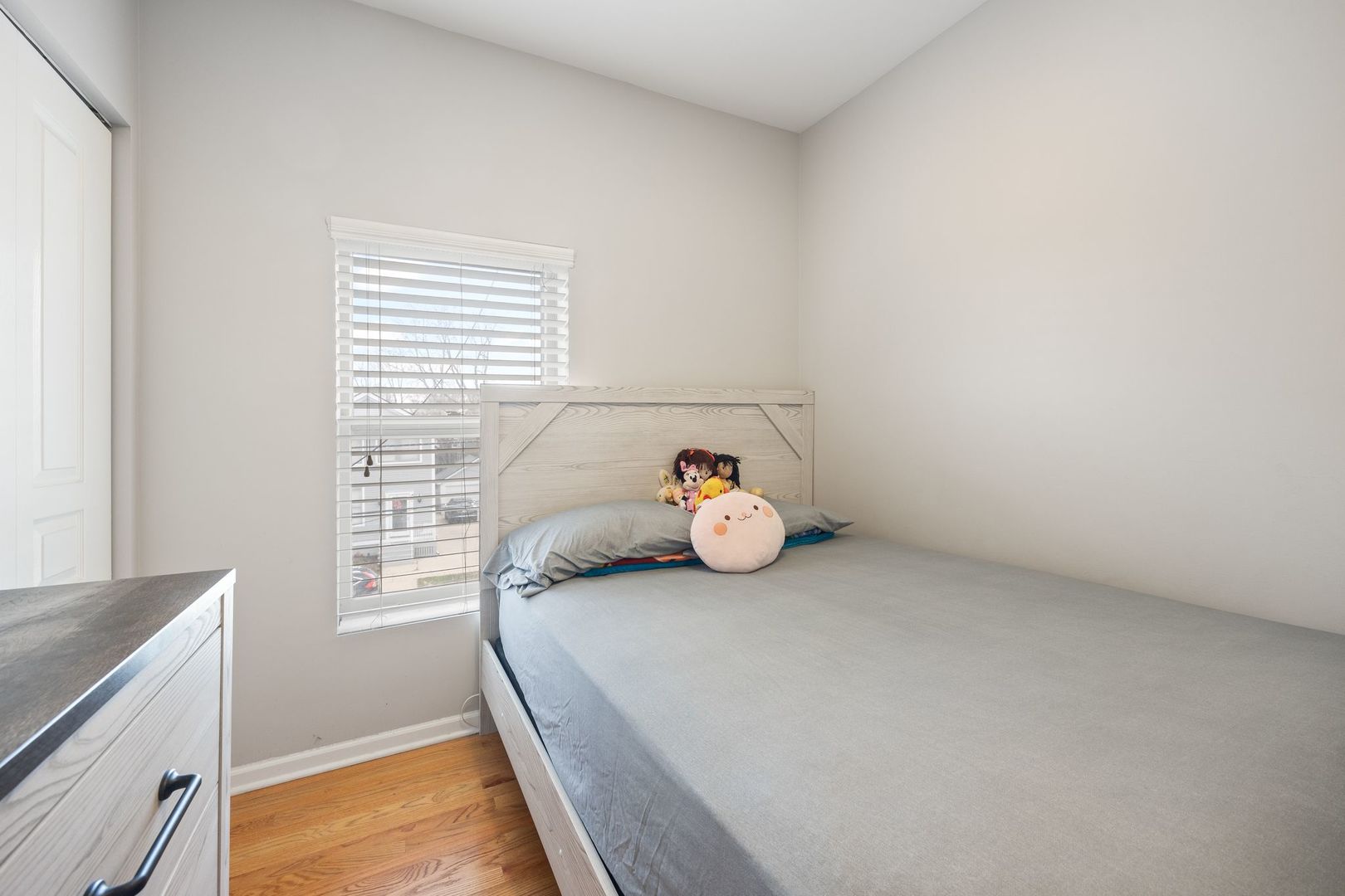 439 Park Street Elgin, IL 60120 - Photo 12 of 20 a bedroom with a bed and a window
