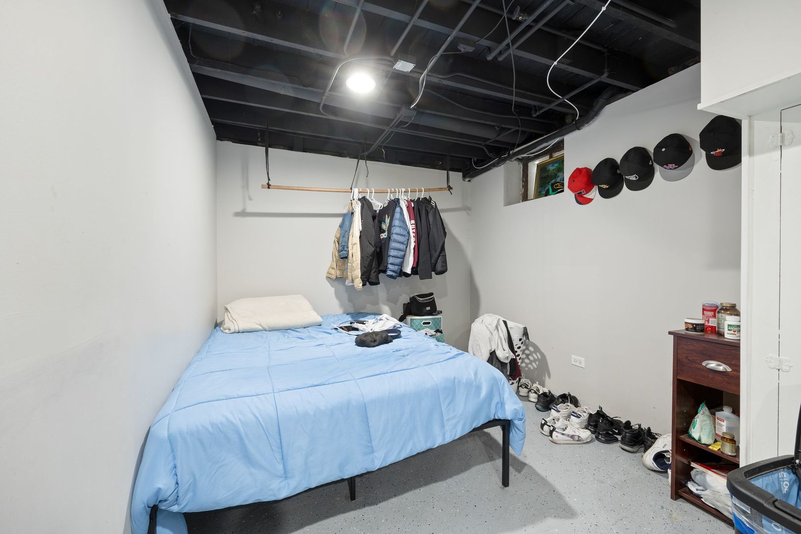 439 Park Street Elgin, IL 60120 - Photo 14 of 20 a bedroom with a bed and a walk in closet