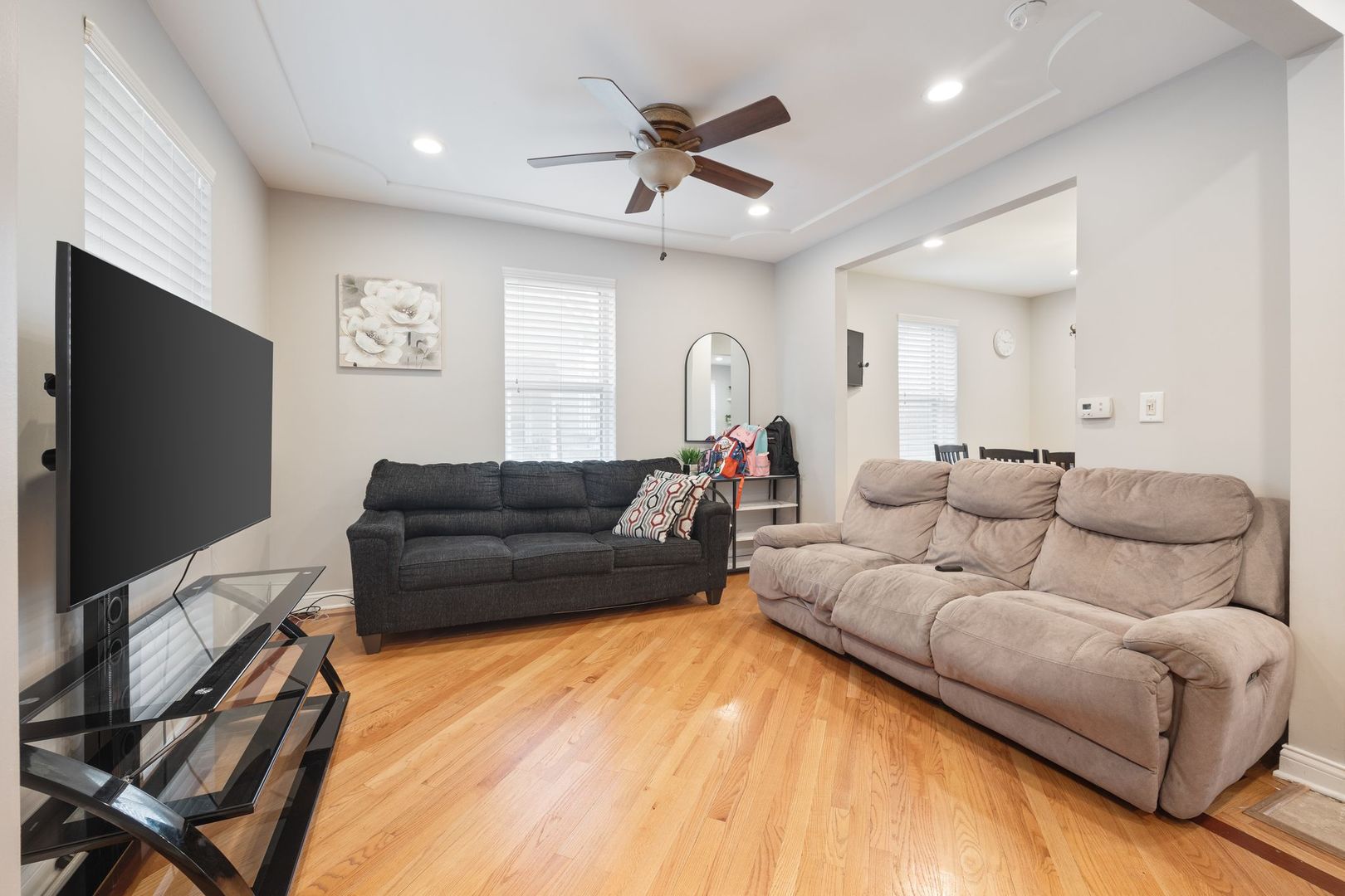 439 Park Street Elgin, IL 60120 - Photo 3 of 20 a living room with furniture and a flat screen tv