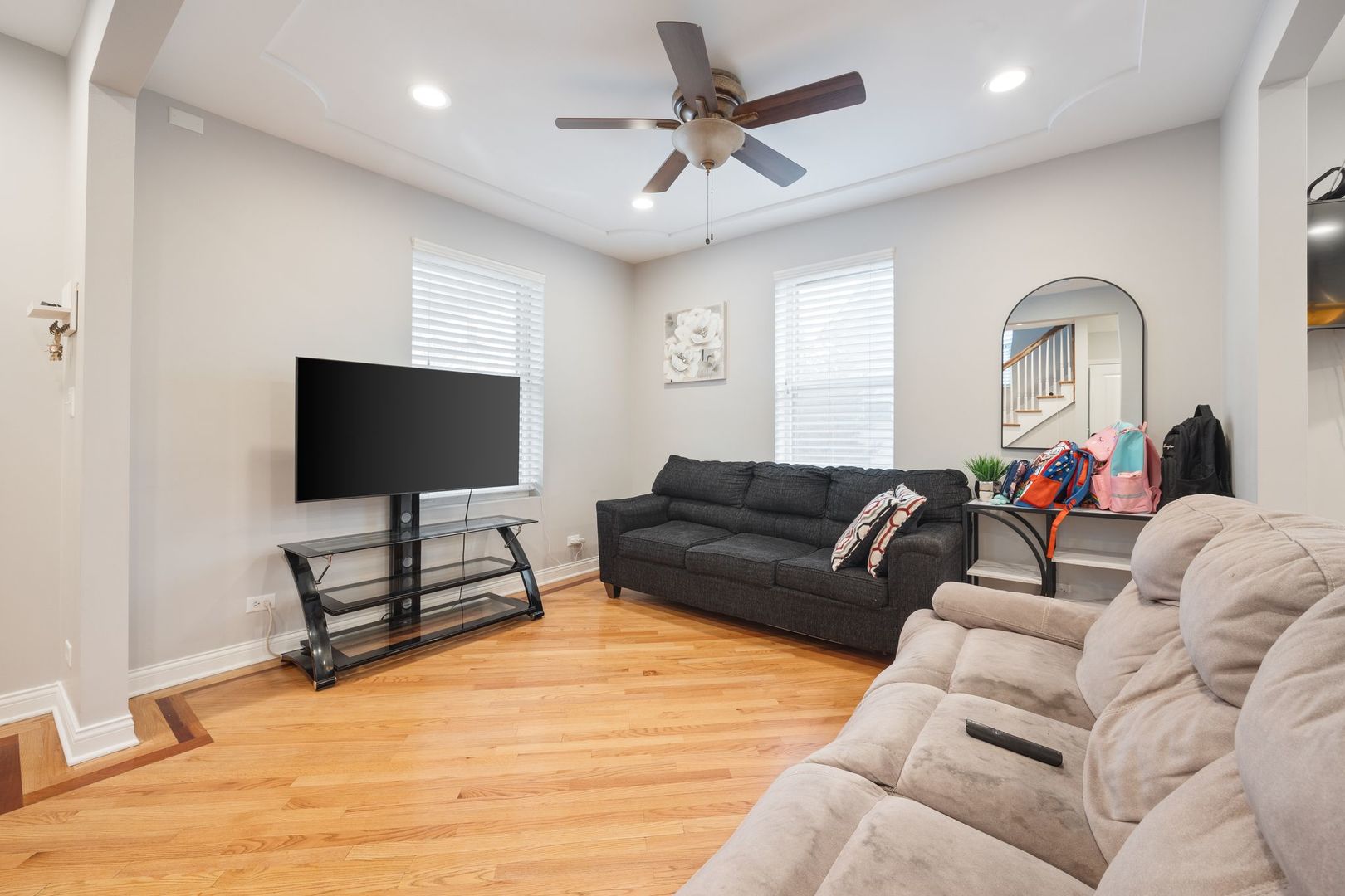 439 Park Street Elgin, IL 60120 - Photo 4 of 20 a living room with furniture and a flat screen tv