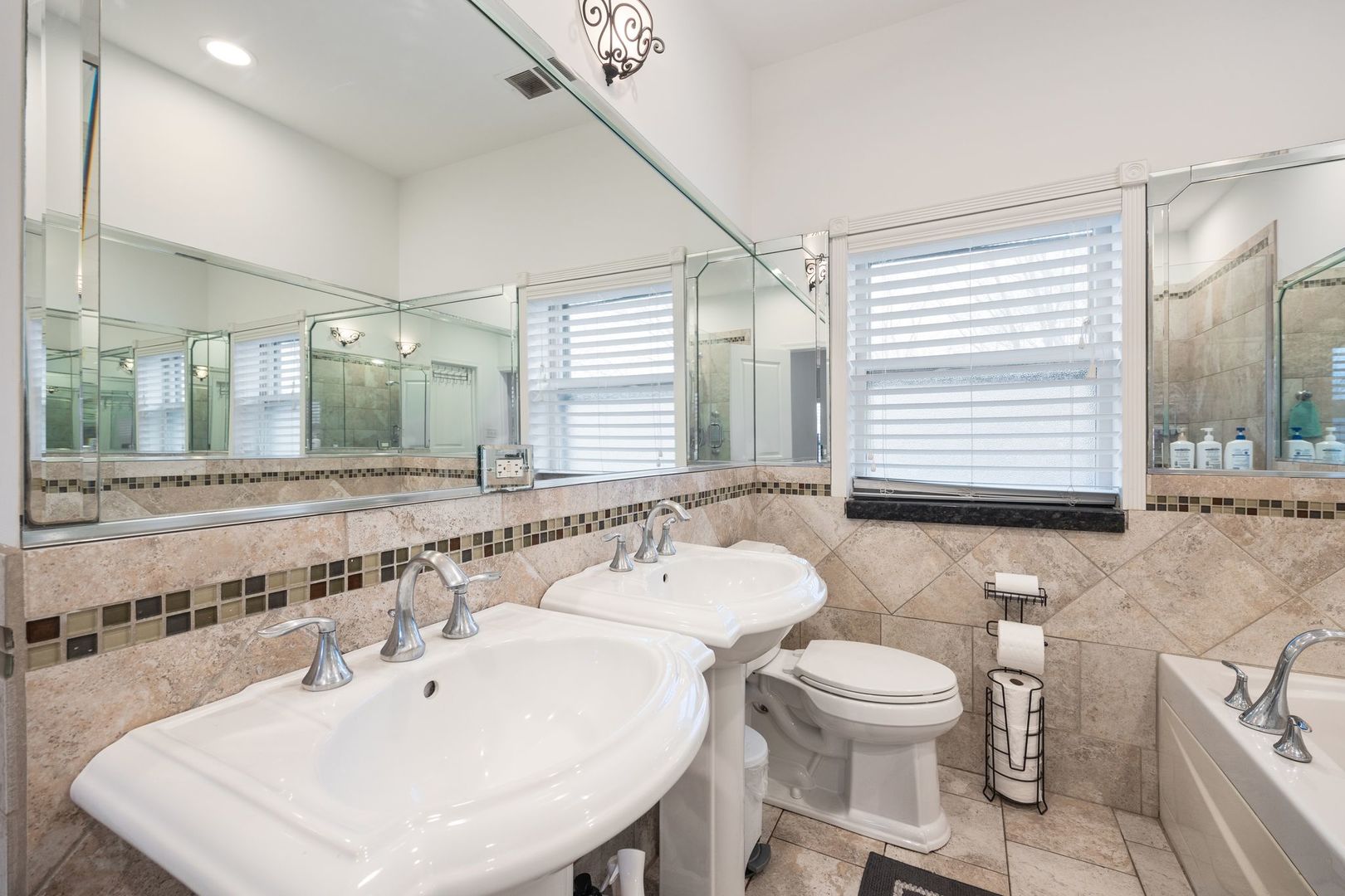 439 Park Street Elgin, IL 60120 - Photo 9 of 20 a bathroom with a sink and a mirror