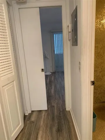 a view of a balcony cabinets and empty room