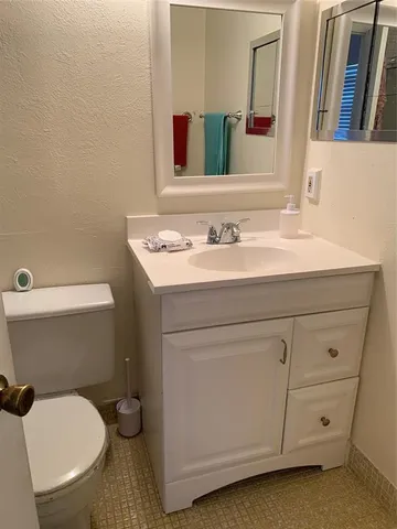 a view of a hall with stairs