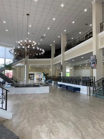 a living room with pool table