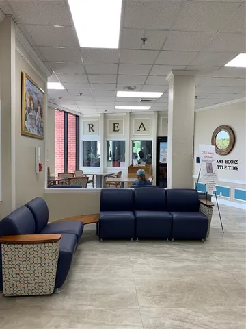 a view of a swimming pool with a porch