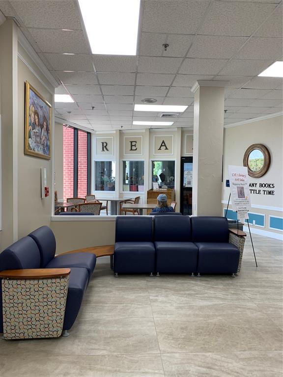 236 Prescott L, Unit 236 Deerfield Beach, FL 33442 - Photo 46 of 61 a living room with furniture and a flat screen tv