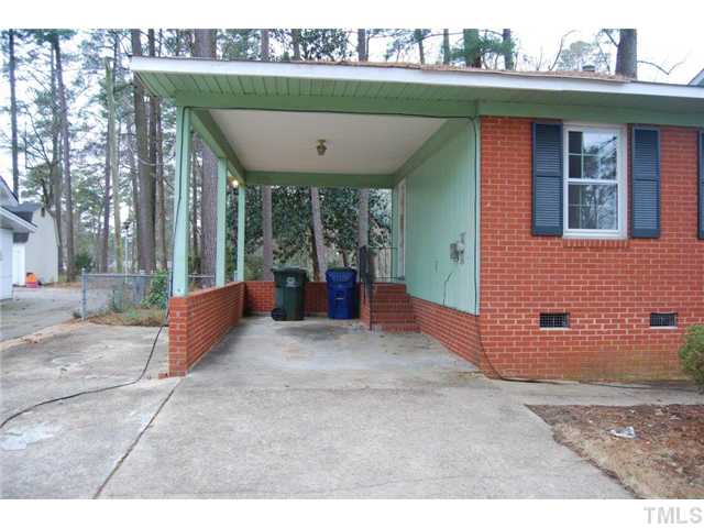 3916 Willow Oak Road Raleigh, NC 27604 - Photo 6 of 17 a view of a house with a porch and a patio