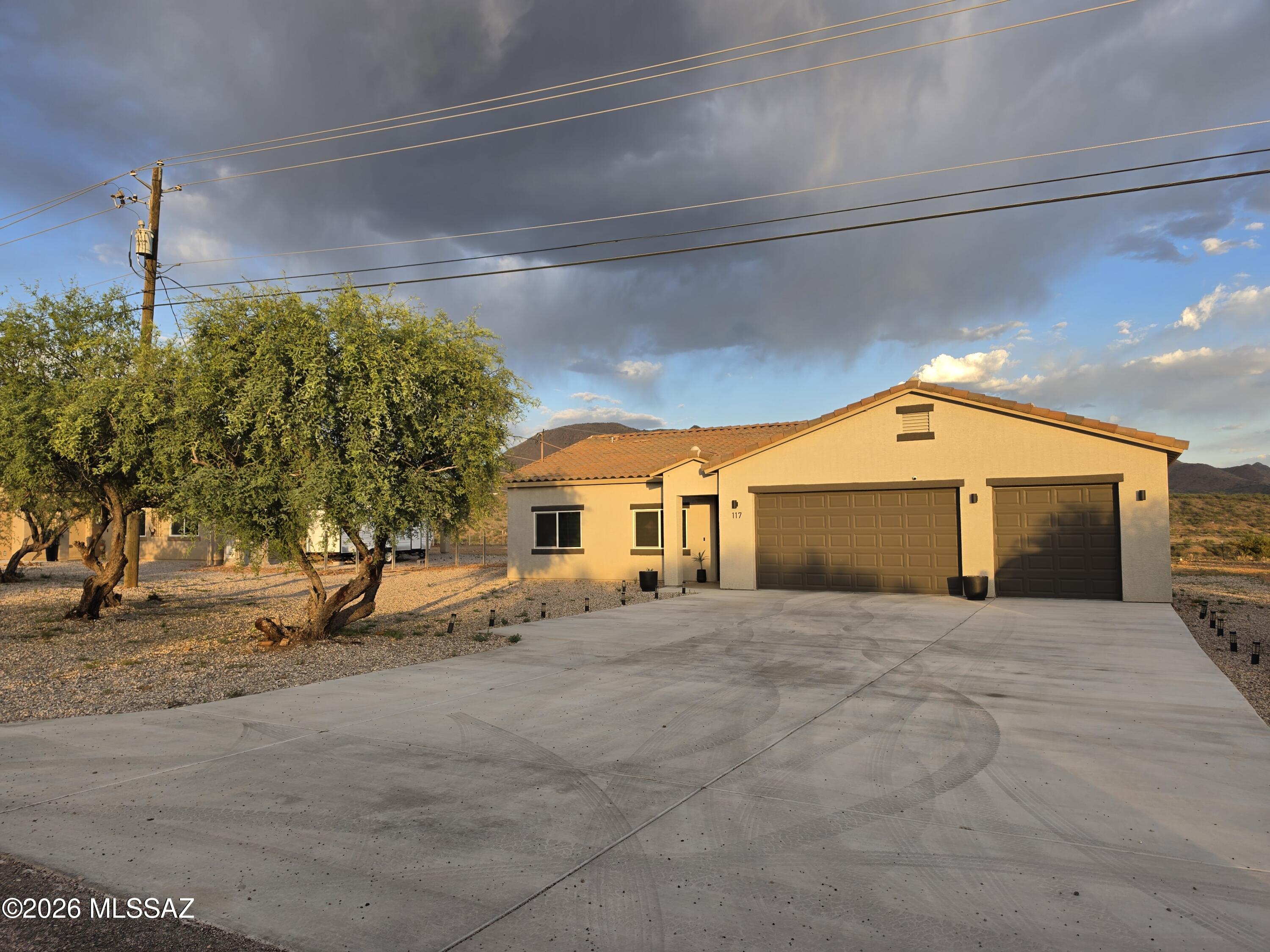 117 Ver Patria Rio Rico, AZ 85648 - Photo 2 of 28 a view of a house with a snow in front of it