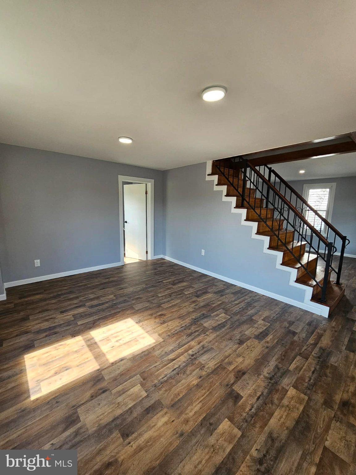9 West Sherman Street Mount Union, PA 17066 - Photo 9 of 24 Spacious living area with modern charm.
