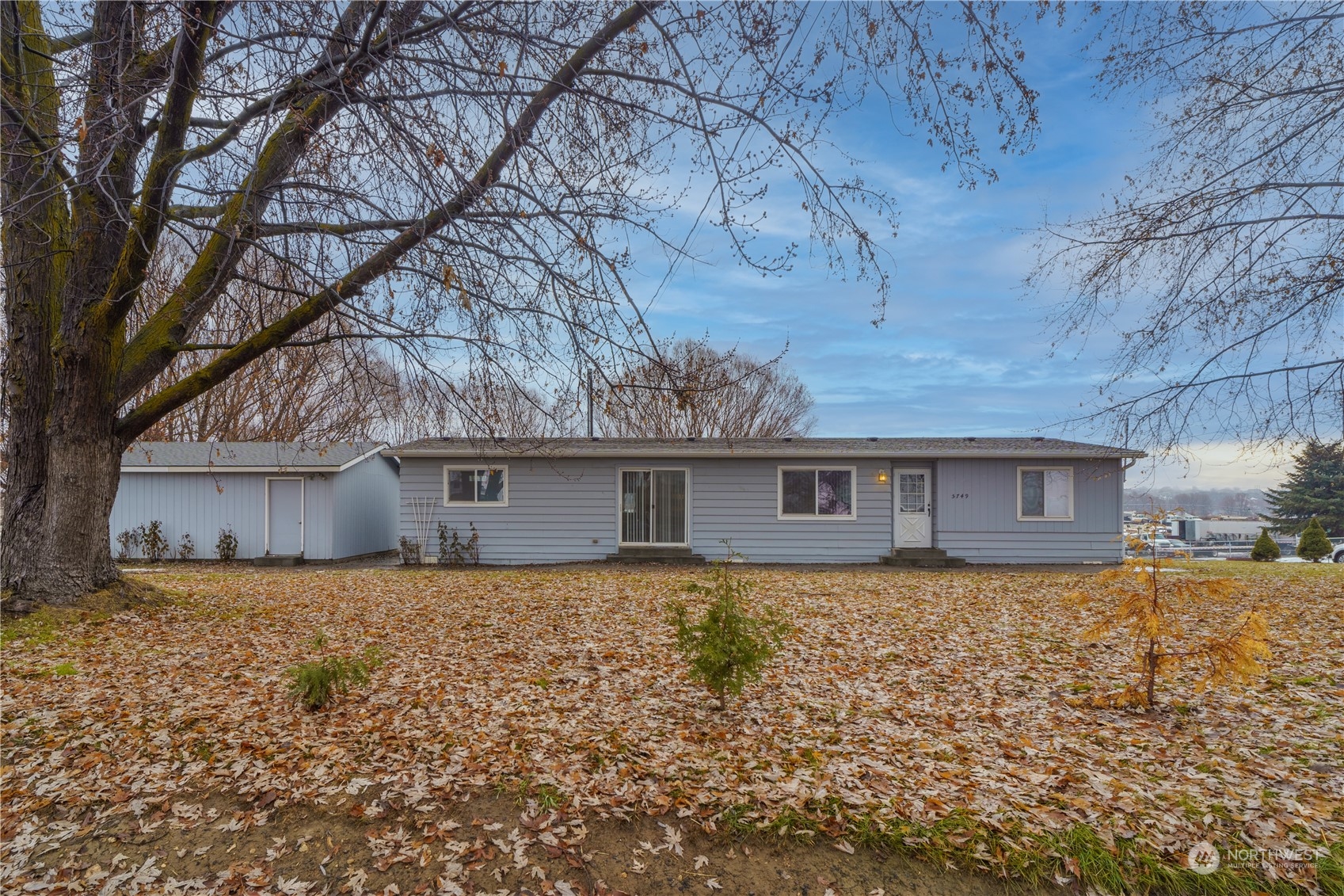 5749 Rd K Northeast Moses Lake, WA 98837 - Photo 1 of 15 front view of house with a yard