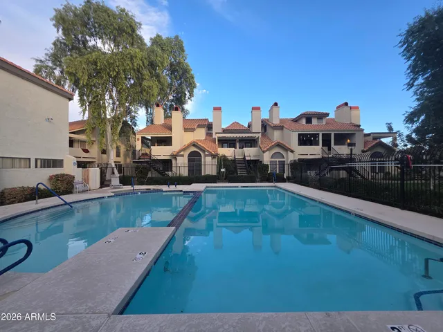 a swimming pool view with a outdoor space