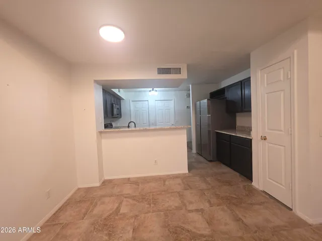 a view of a kitchen with a sink