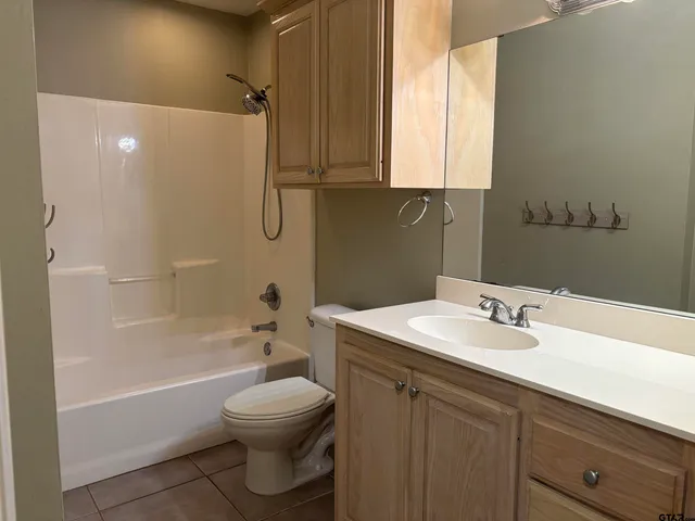 a view of a storage and utility room with a washer and dryer