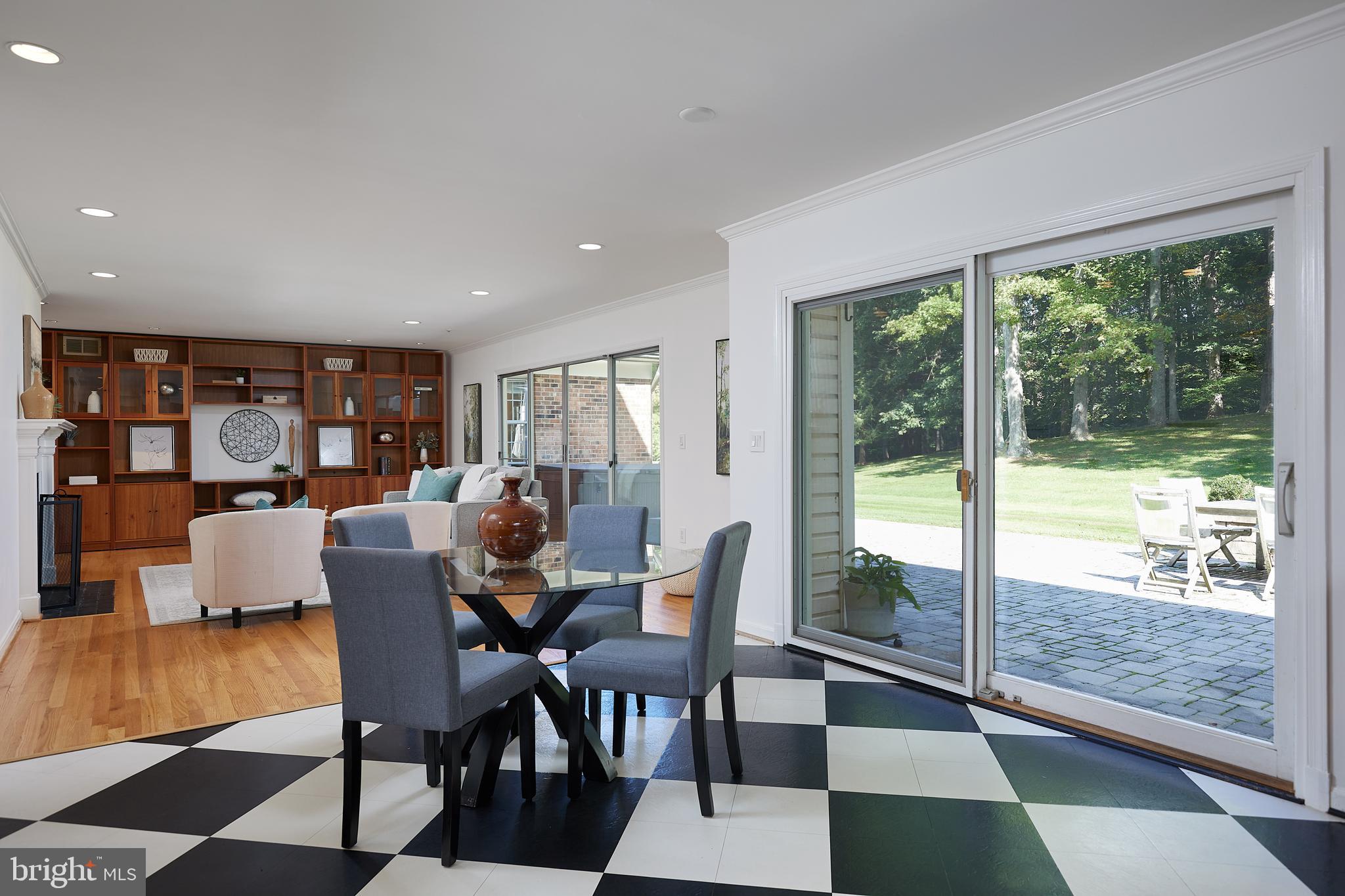 8710 Belmart Road Potomac, MD 20854 - Photo 17 of 56 5 glass sliding panel overlook large patio and par