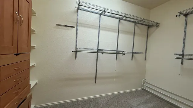 a bathroom with a tub and shower