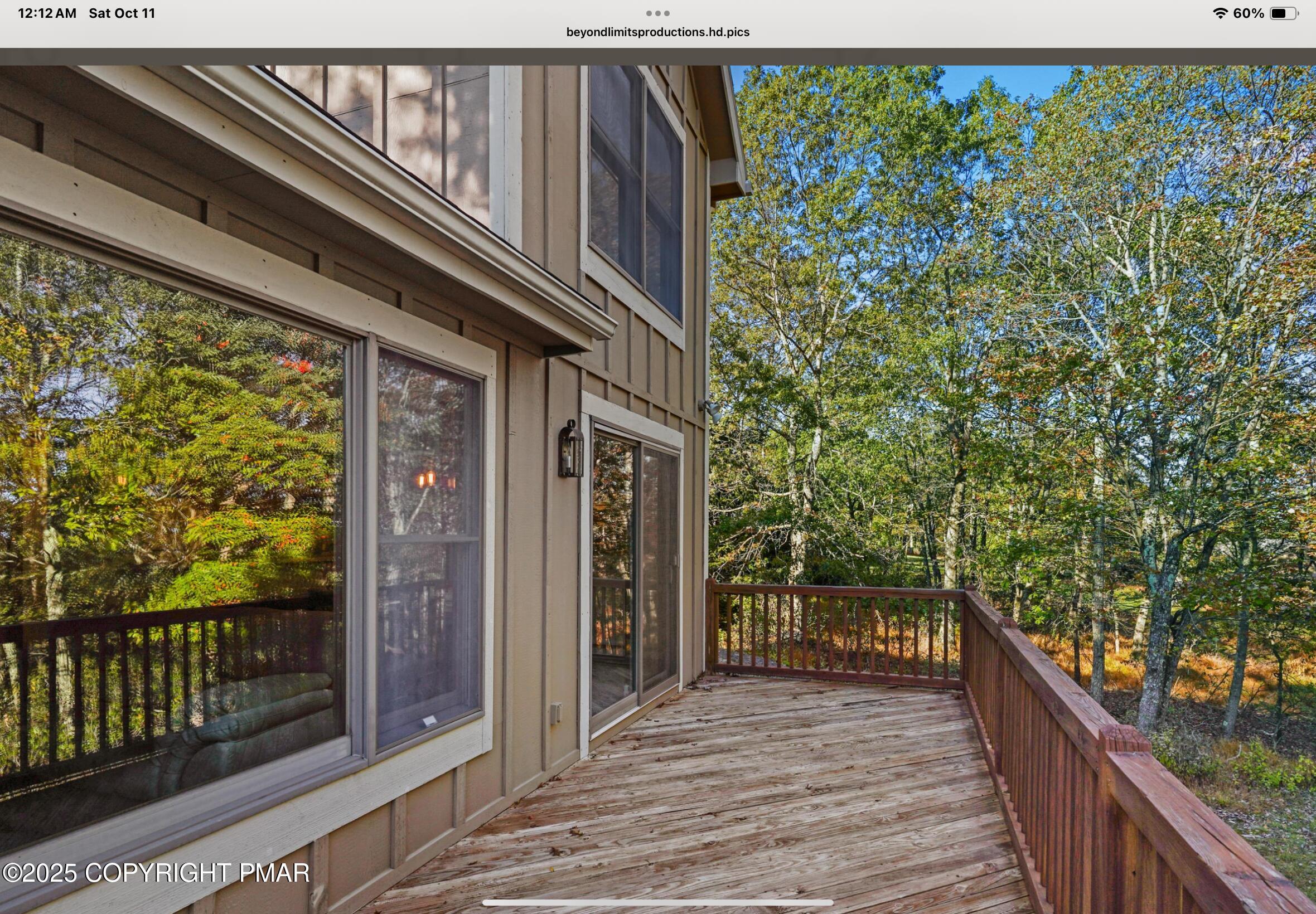 182 Upper Deer Valley Road Tannersville, PA 18372 - Photo 13 of 41 a balcony with wooden floor and deck in the back