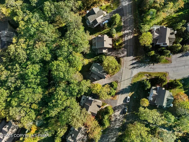 a bedroom with a bunk bed and a dresser
