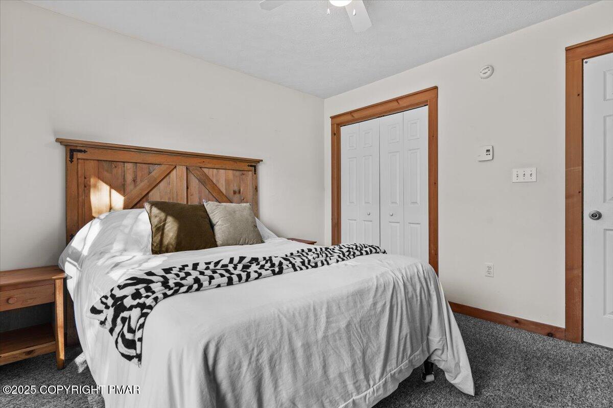 182 Upper Deer Valley Road Tannersville, PA 18372 - Photo 23 of 40 a bedroom with a bed and a window