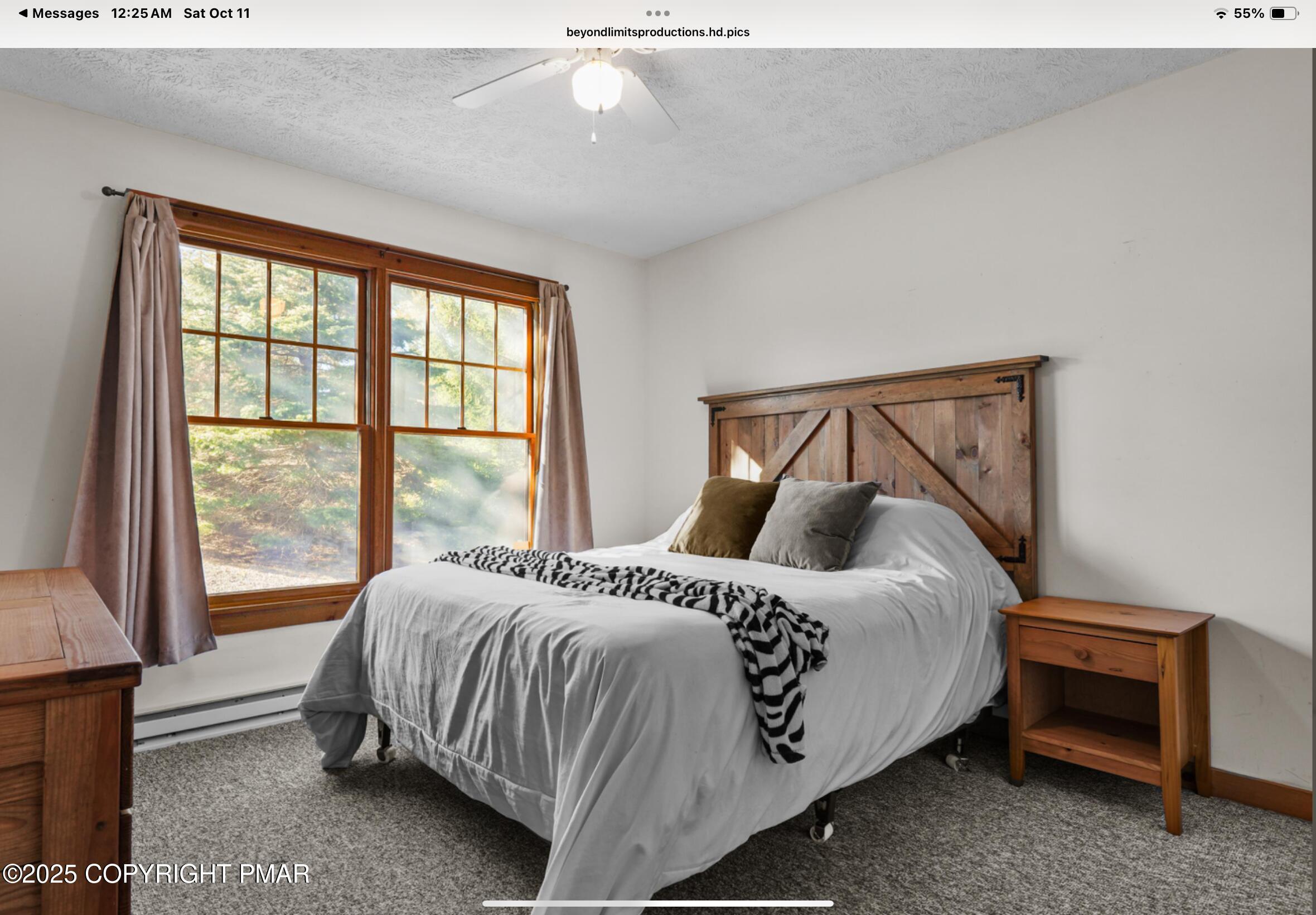 182 Upper Deer Valley Road Tannersville, PA 18372 - Photo 24 of 40 a bedroom with a bed and a window
