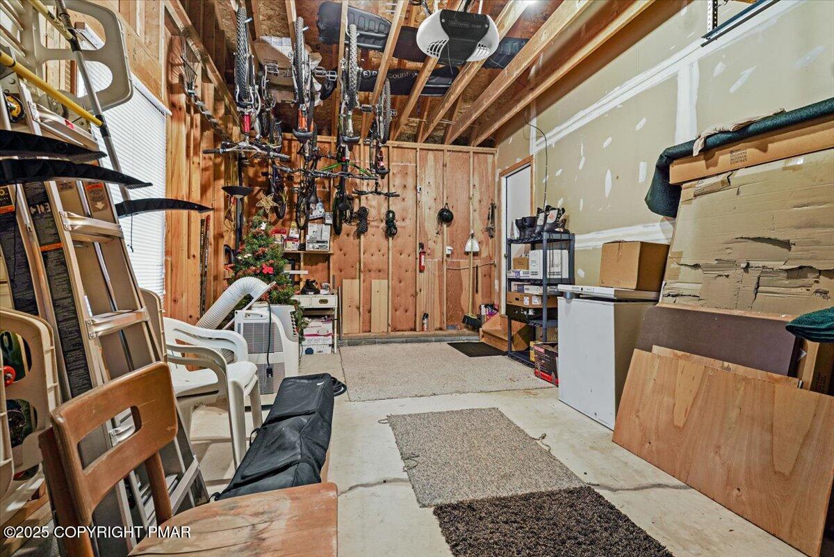 182 Upper Deer Valley Road Tannersville, PA 18372 - Photo 32 of 40 a view of walk in closet with clothes and shoes