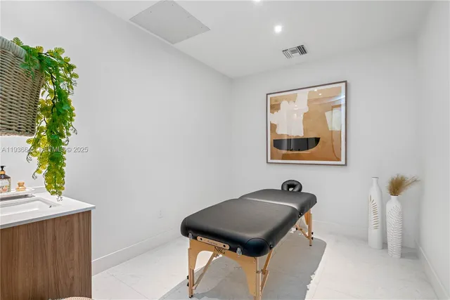 a room with a table and chairs