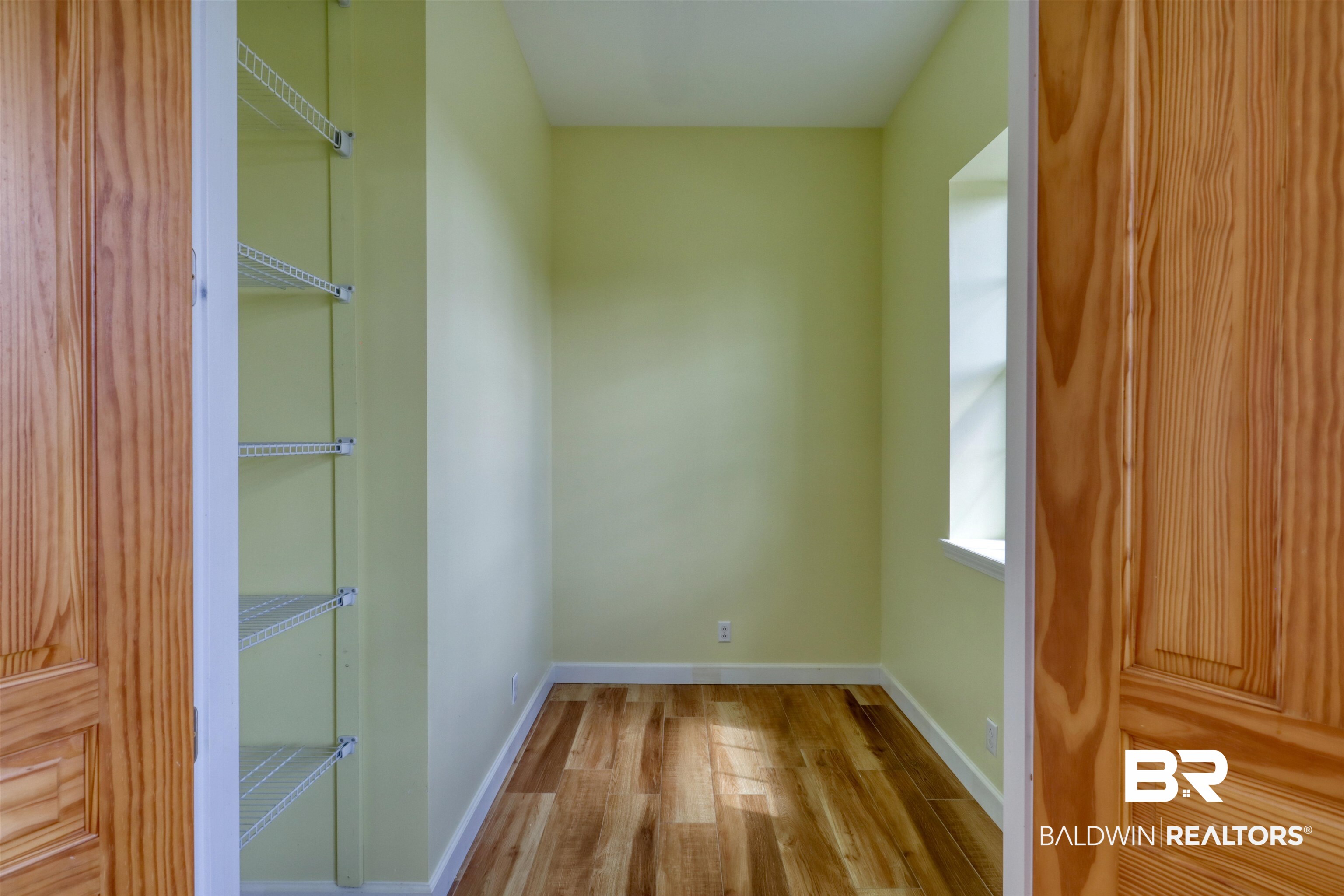 28461 Gardner Road Elberta, AL 36530 - Photo 6 of 46 Unfurnished room with light wood finished floors and baseboards