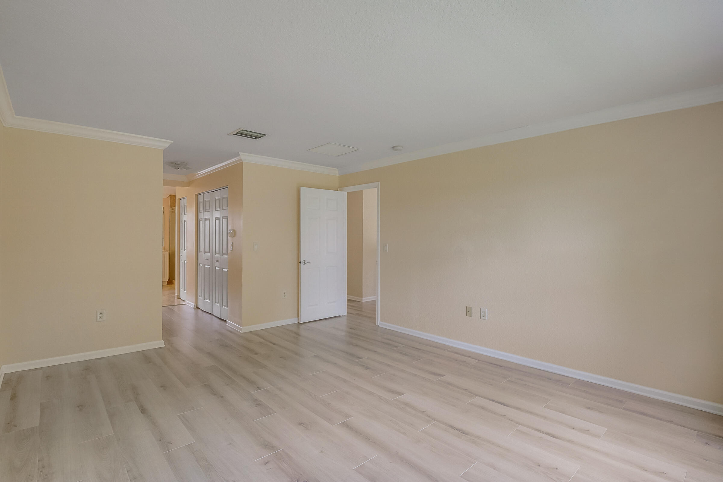 10208 White Water Lily Way Boynton Beach, FL 33437 - Photo 13 of 38 a view of an empty room and wooden floor