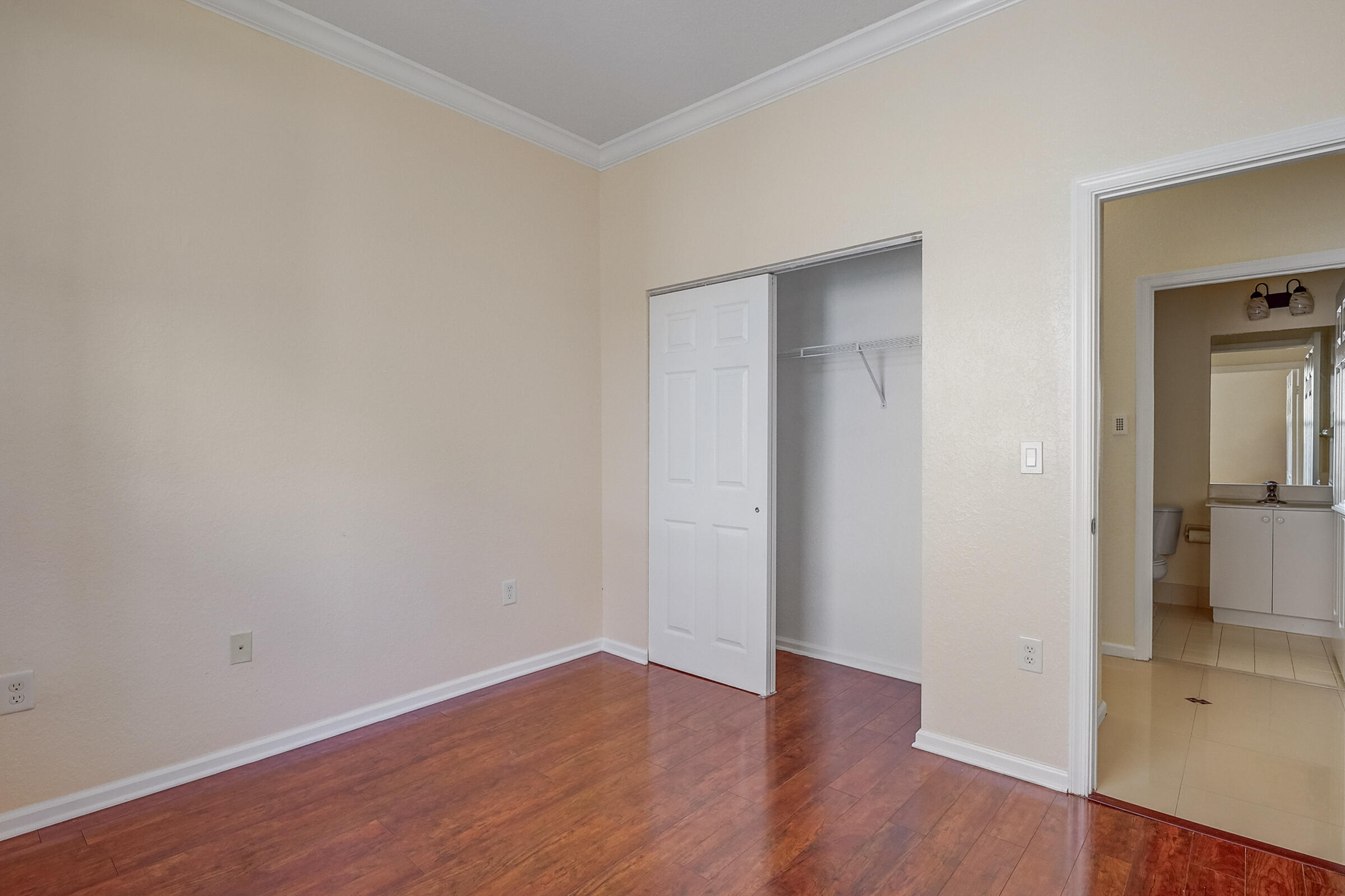 10208 White Water Lily Way Boynton Beach, FL 33437 - Photo 17 of 38 a view of a room with wooden floor