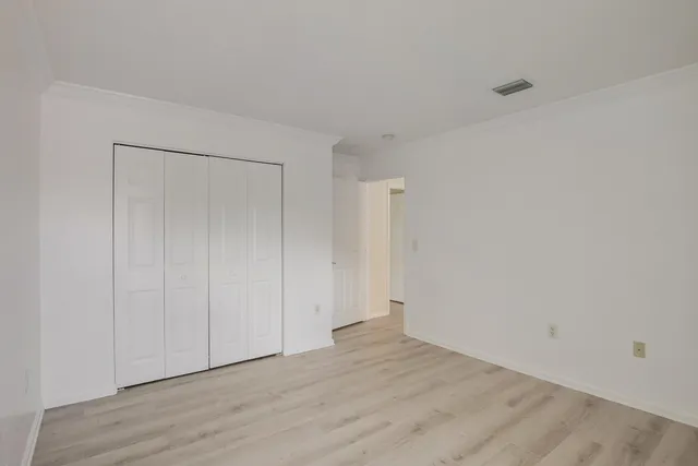 a view of a hallway with staircase
