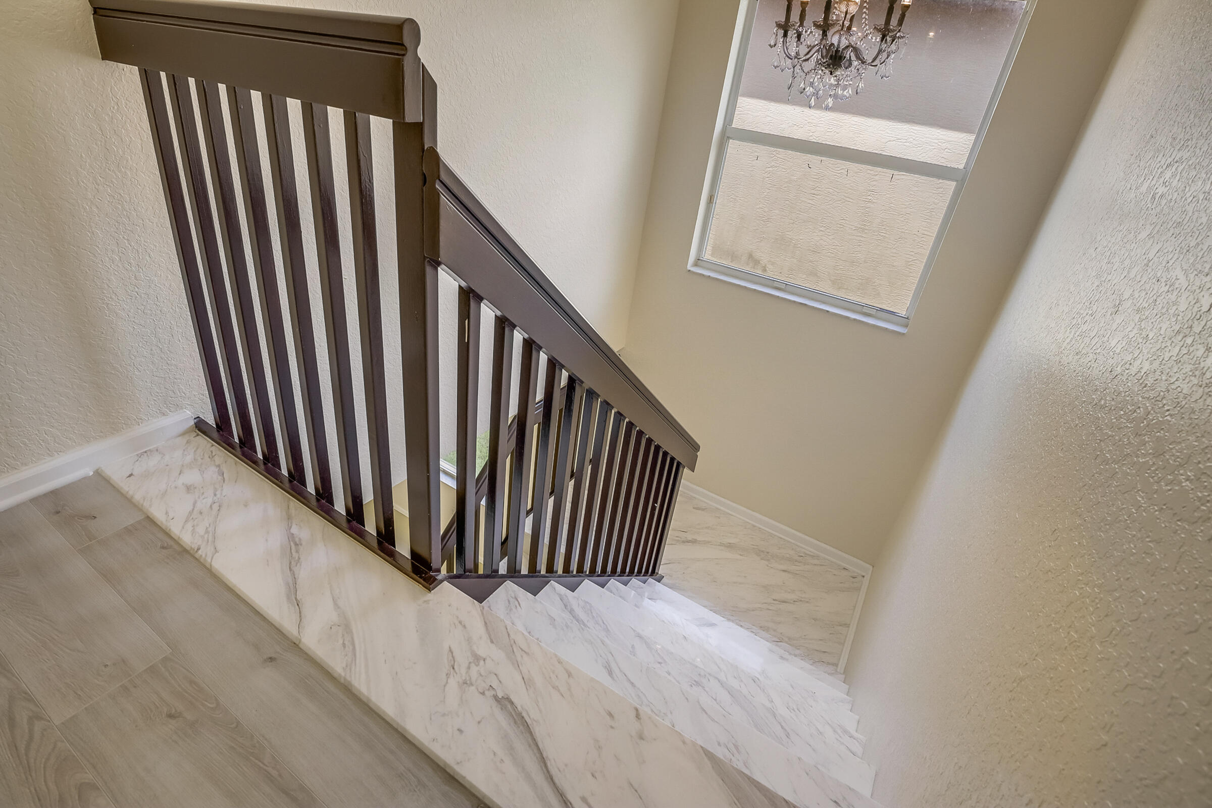 10208 White Water Lily Way Boynton Beach, FL 33437 - Photo 21 of 38 a view of a hallway with staircase