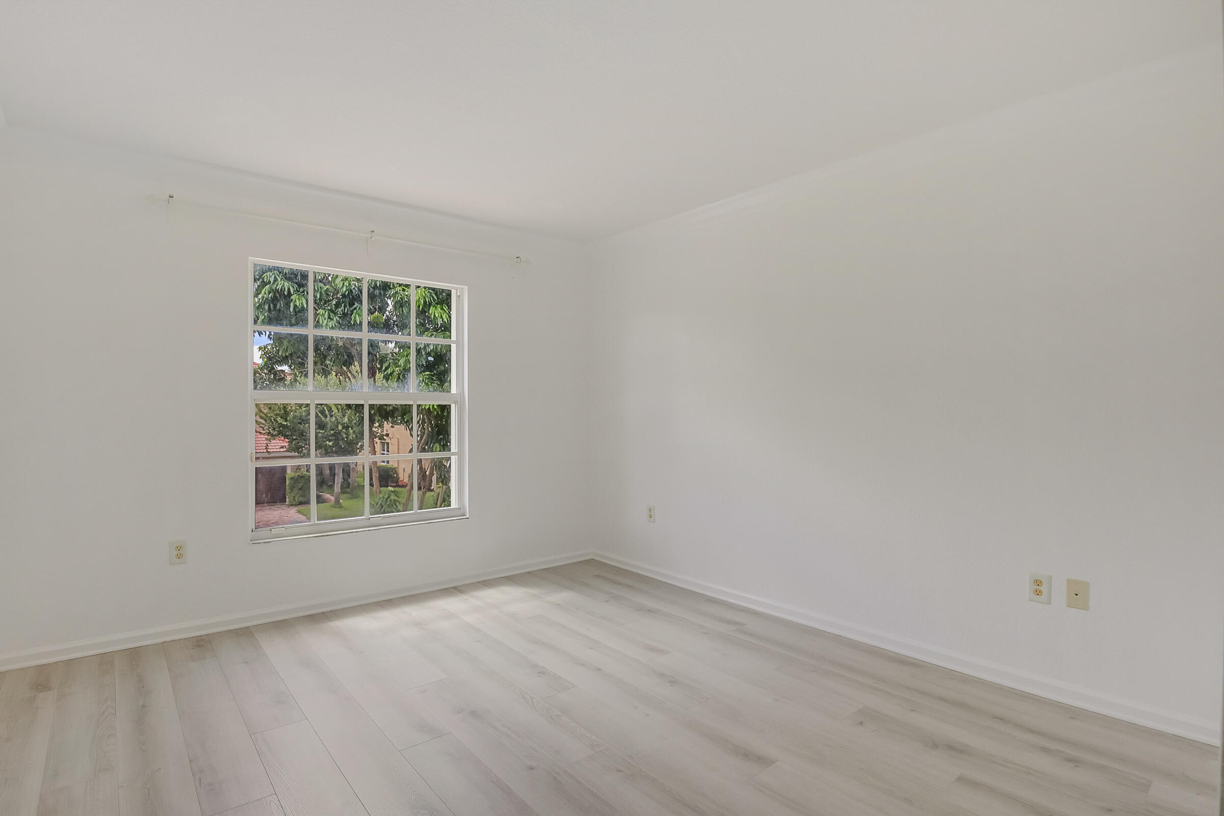 10208 White Water Lily Way Boynton Beach, FL 33437 - Photo 25 of 38 an empty room with a window