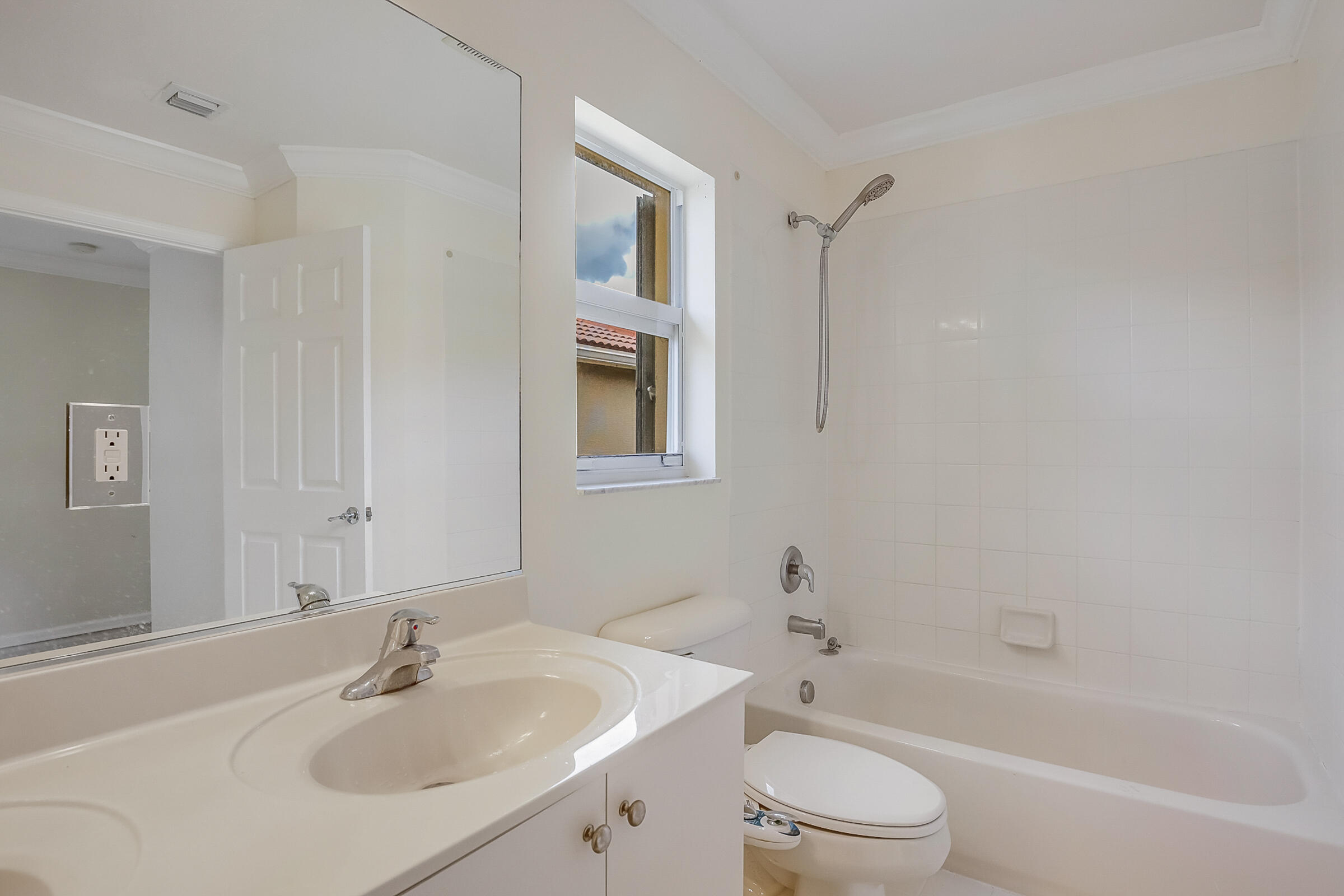 10208 White Water Lily Way Boynton Beach, FL 33437 - Photo 28 of 38 a bathroom with a sink toilet and shower