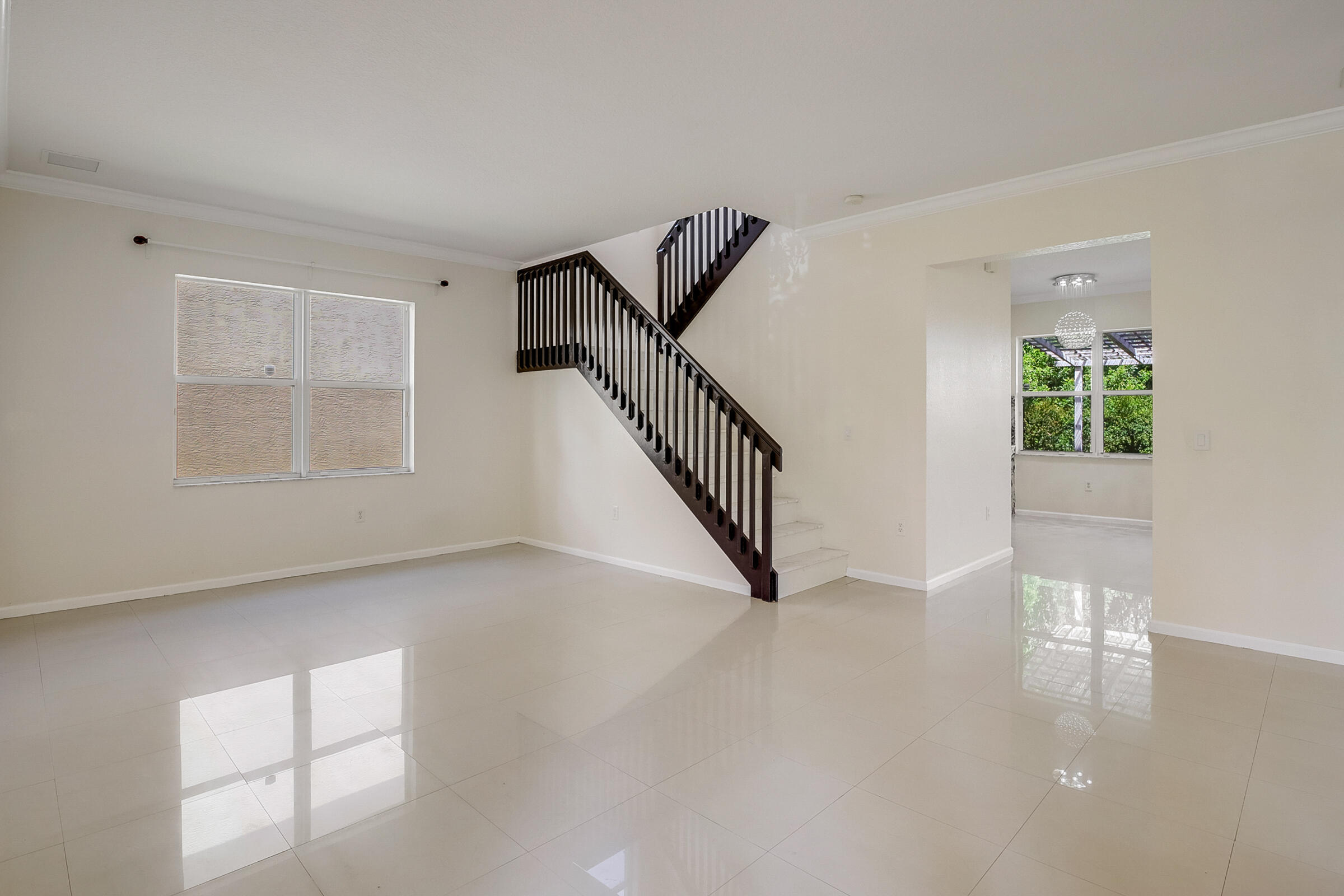 10208 White Water Lily Way Boynton Beach, FL 33437 - Photo 3 of 38 a view of an empty room with a window