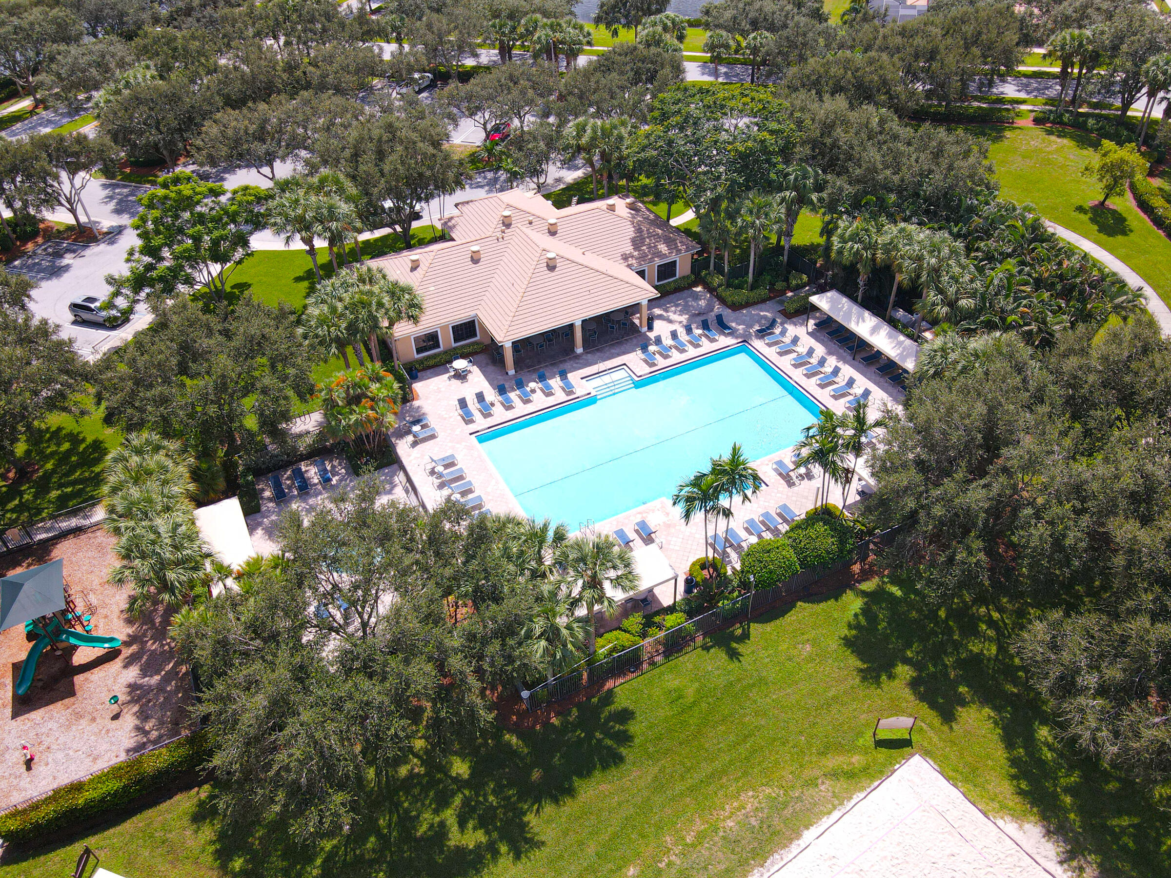 10208 White Water Lily Way Boynton Beach, FL 33437 - Photo 35 of 38 an aerial view of a house with a garden and lake view