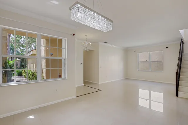 a view of a livingroom with furniture window and outside view