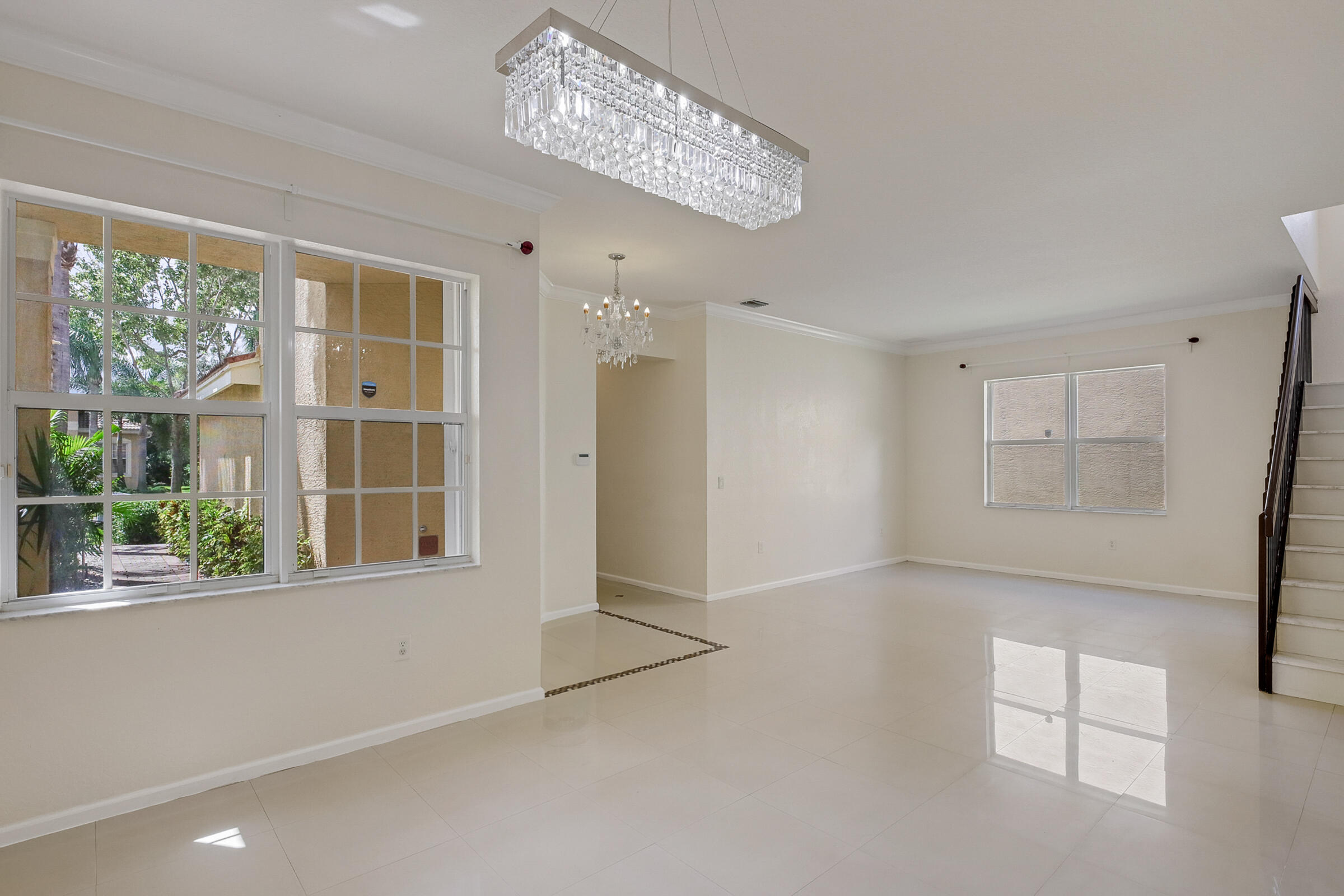 10208 White Water Lily Way Boynton Beach, FL 33437 - Photo 5 of 38 a view of an empty room with a window