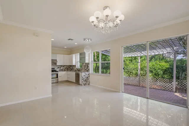 a view of kitchen and windows