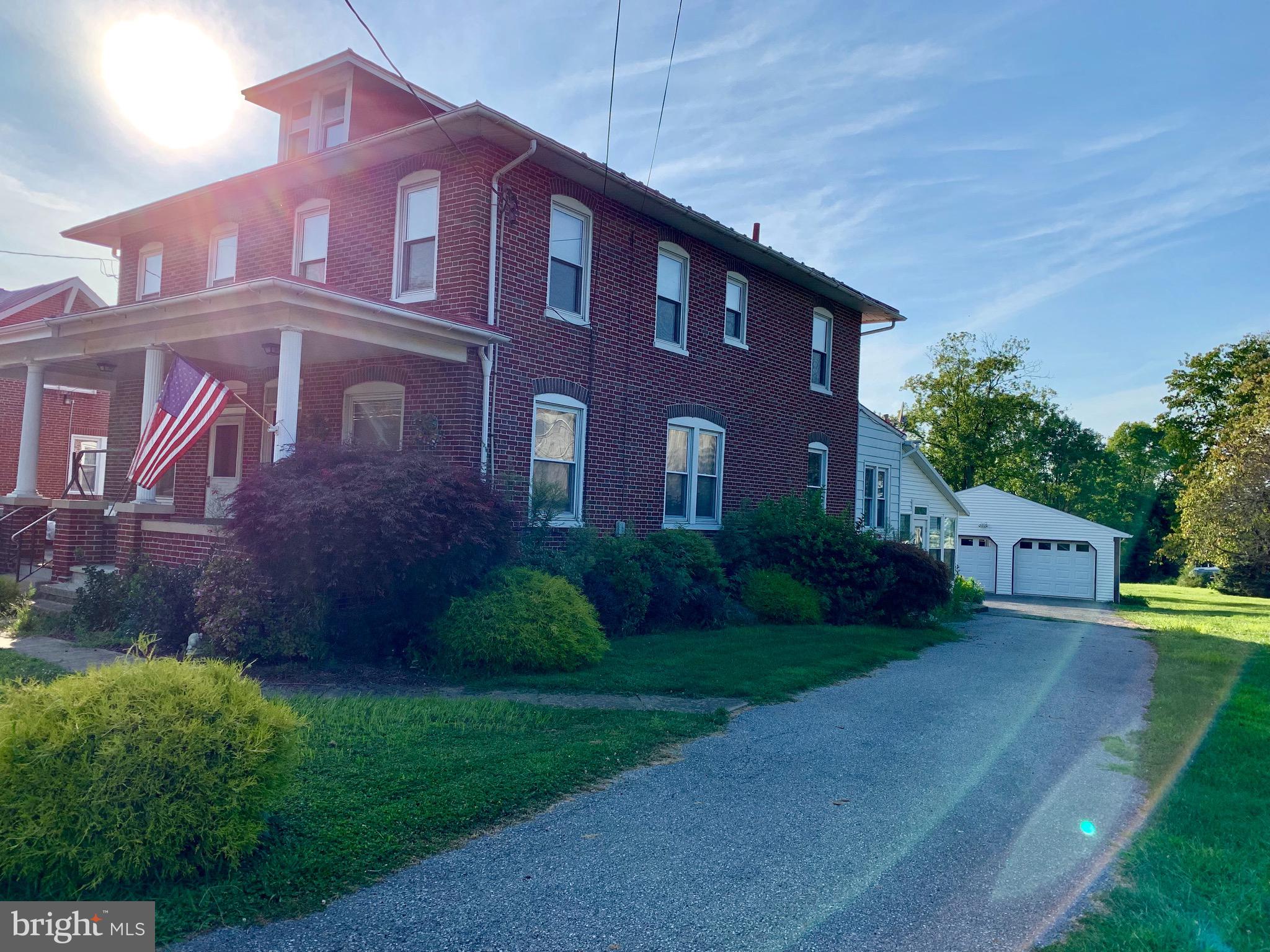 931 Fritztown Road Reading, PA 19608 - Photo 1 of 12 a view of a brick building next to a yard