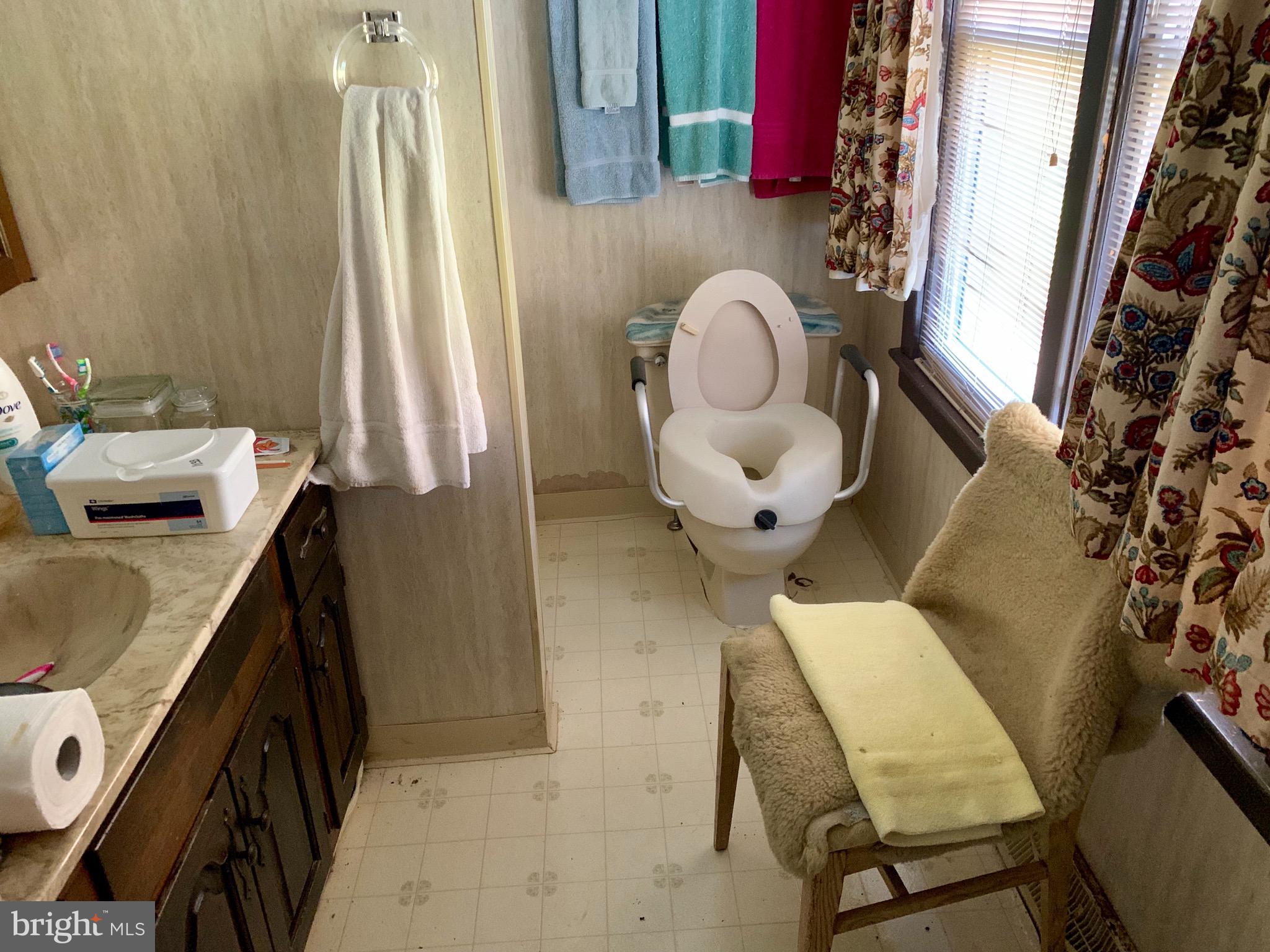 931 Fritztown Road Reading, PA 19608 - Photo 3 of 12 a bathroom with a sink and a mirror