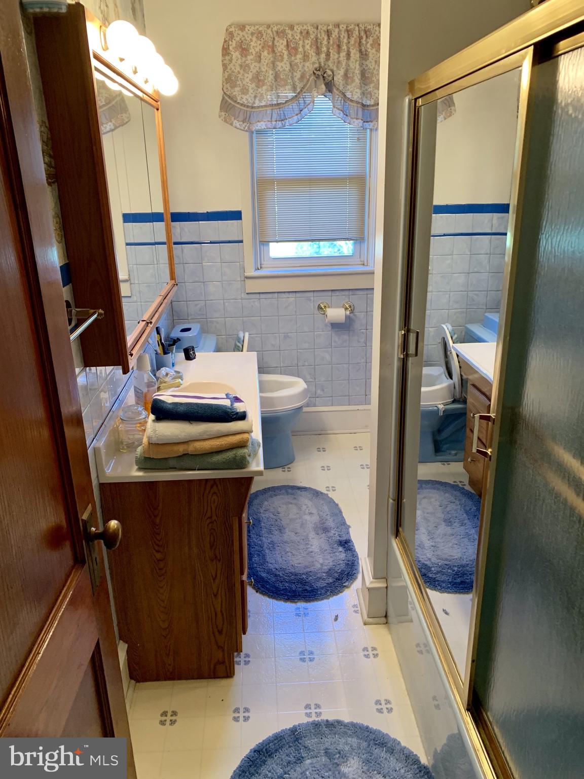 931 Fritztown Road Reading, PA 19608 - Photo 9 of 12 a bathroom with a sink toilet and shower