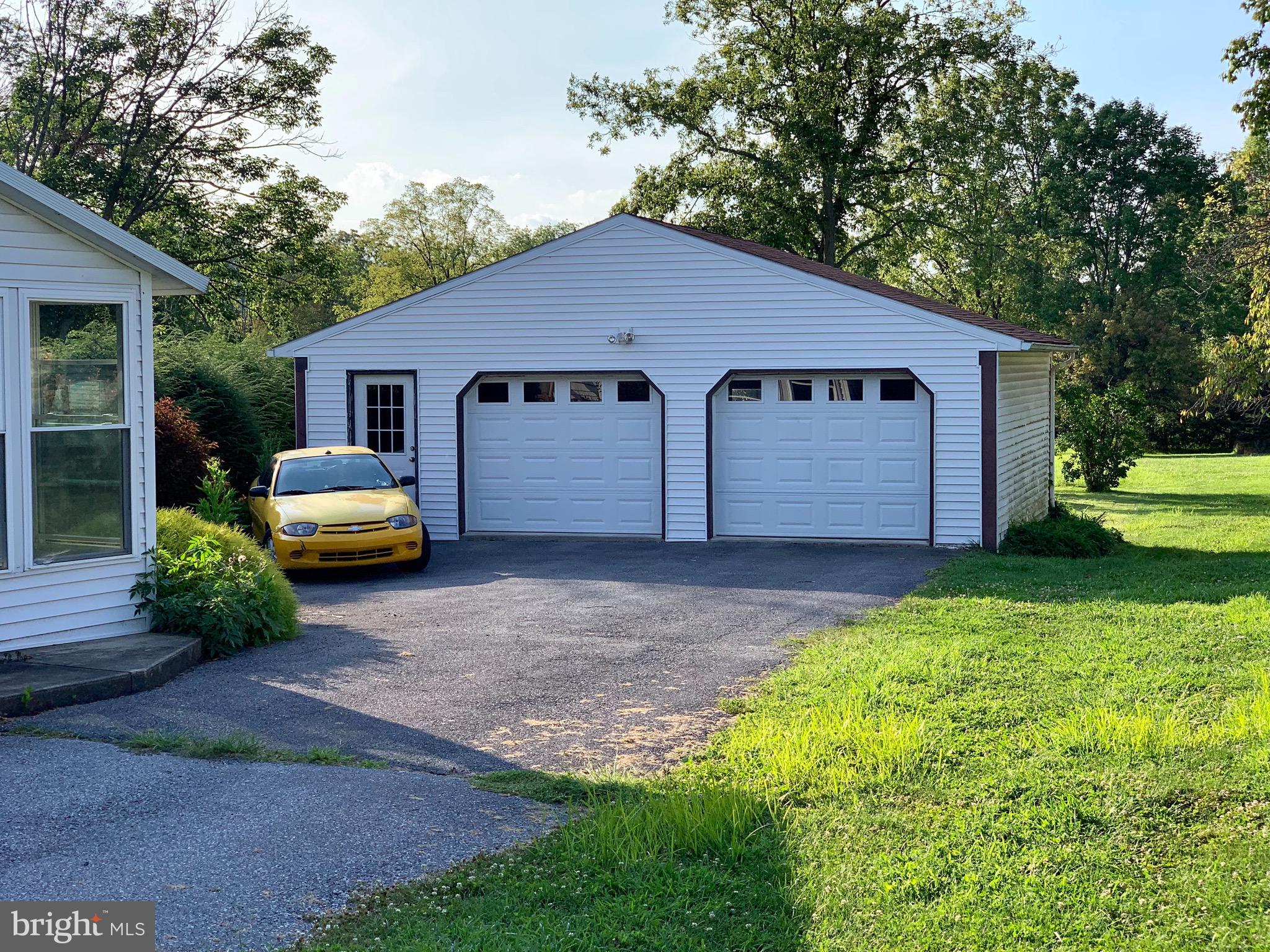 931 Fritztown Road Reading, PA 19608 - Photo 10 of 12 a house view with a garden space