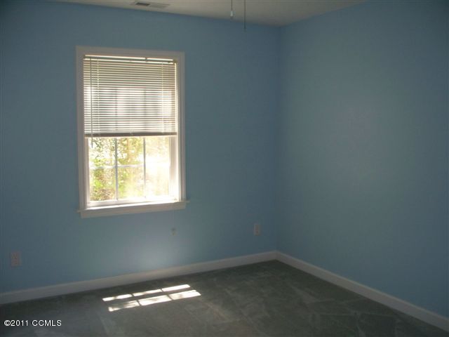 923 Roberts Road Newport, NC 28570 - Photo 9 of 12 Second bedroom