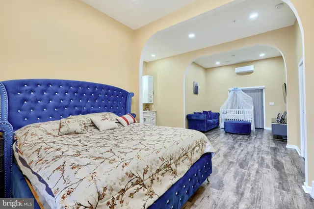 a bathroom with a toilet a sink and a window