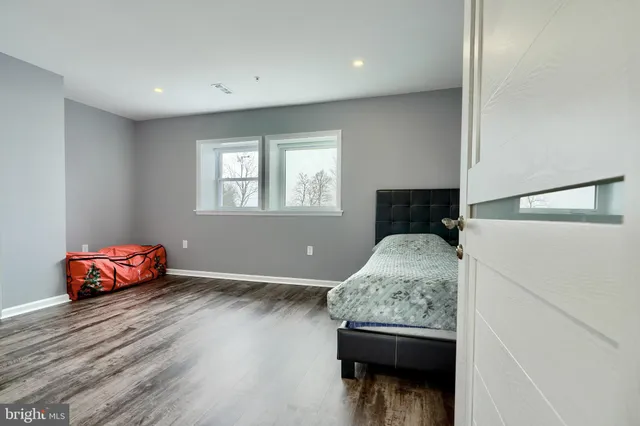 a view of street with iron fence