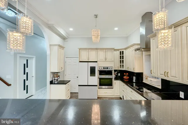 a view of a dining room with furniture and window