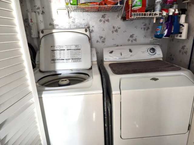 a utility room with dryer and washer