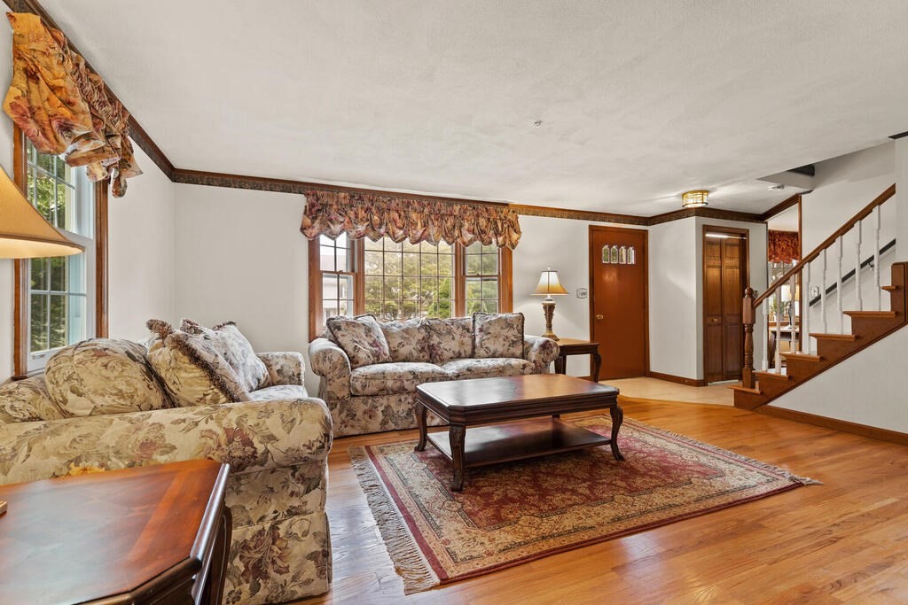1 Robbin Road Canton, MA 02021 - Photo 11 of 40 a living room with furniture and a large window