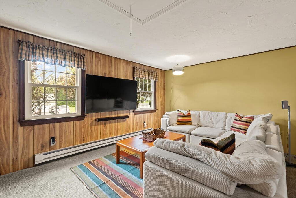1 Robbin Road Canton, MA 02021 - Photo 16 of 40 a living room with furniture and a flat screen tv